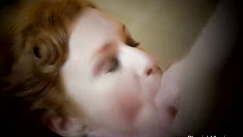 Red-haired milf does blowjob without the help of hands