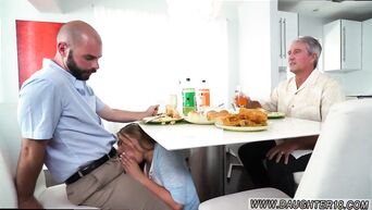 During dinner with her father, the blonde makes a guy blowjob under the table