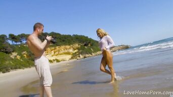Photographer fucks model in ass on the beach