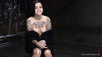 Ultra tattooed brunette Leigh Raven gets BDSM masturbation