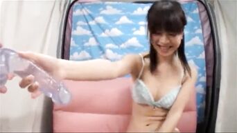 Young Japanese housewife laughs during first sex in front of camera