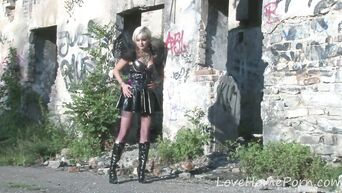 Gothic outdoor striptease in ruins