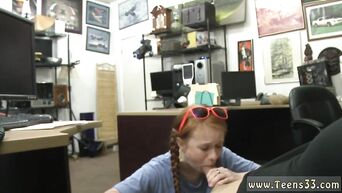 Teen porn: Red-haired girl does blowjob to young manager in the office