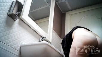 Hot masturbation in the toilet with a hidden camera