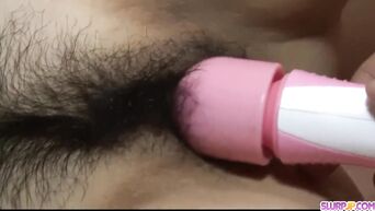 Hairy pussy of Japanese whore is appeased by two partners