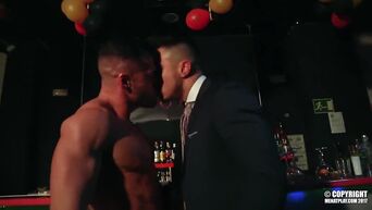 Homosexuals are engaged in oral and anal sex in bar