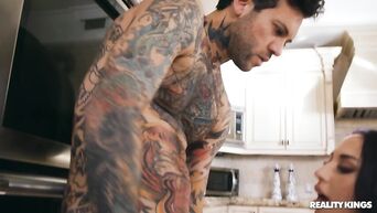 Appetizing tight brunette is pleasuring hardcore fuck with tattooed dude