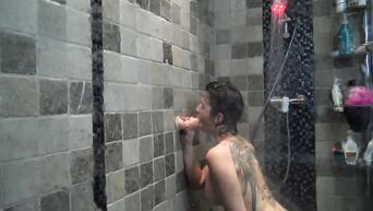 Tattooed nymphomaniac gets orgasms even during shower