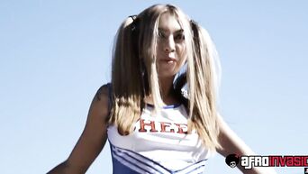 American cheerleader Kat Dior raises morale of team captain